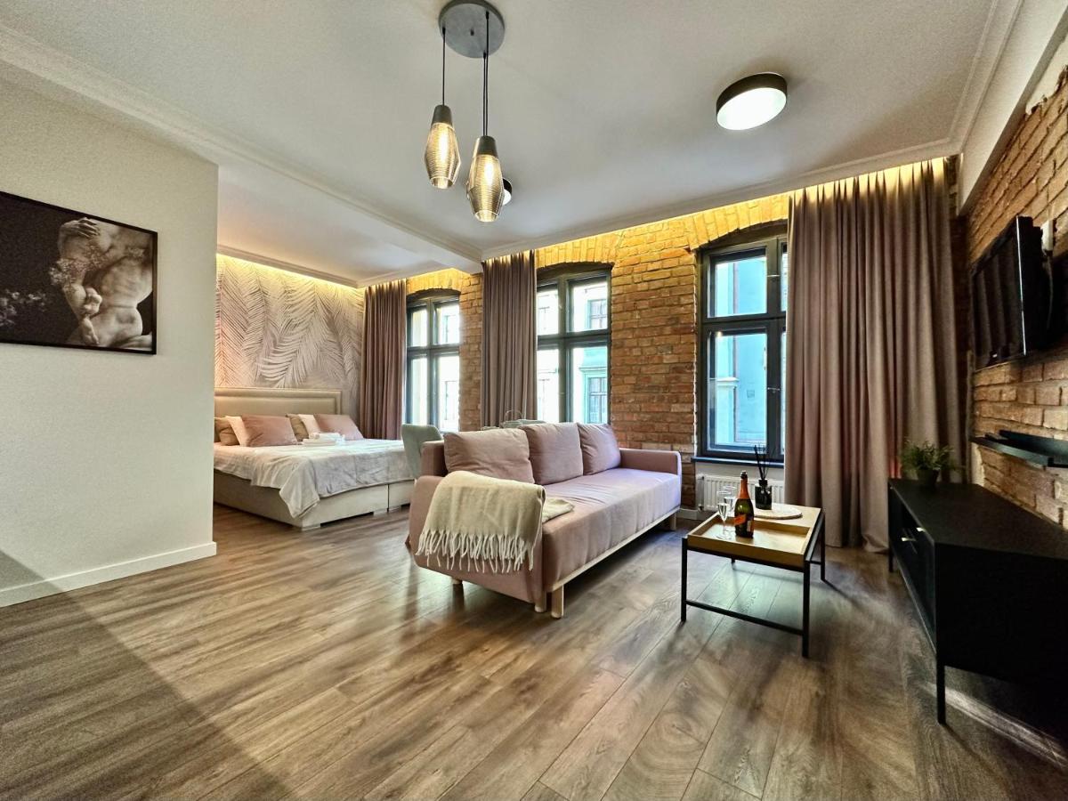 Pastelove Okna Stary Toruń Buitenkant foto